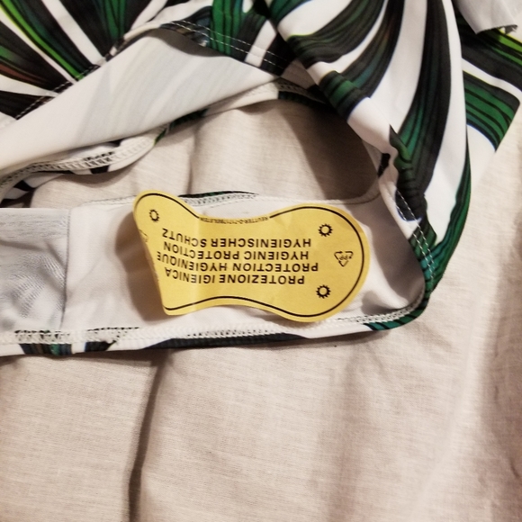 Nwt sexy low cut front and back tie back high cut one piece. Wide straps - Picture 4 of 10